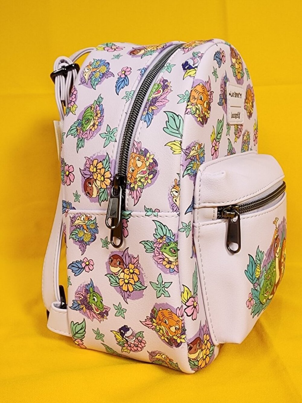Loungefly The Land Before Time Dinosaurs Floral Purple Soft Tag Mini Backpack - Picture 3 of 11